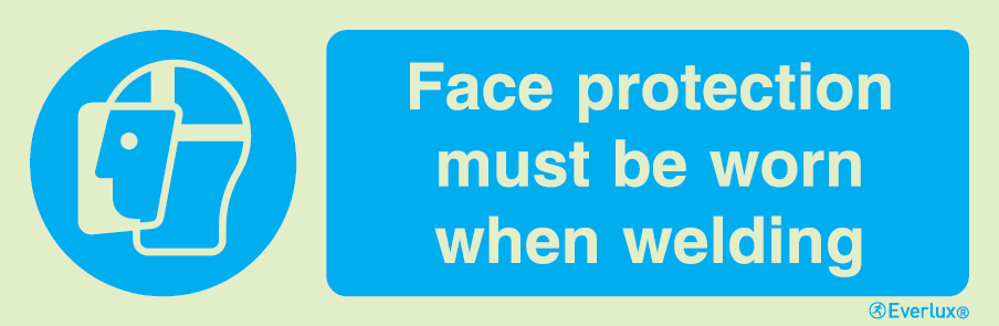 Photoluminescent self-adhesive vinyl 300x100mm Face protection must be worn when welding - mandatory sign
